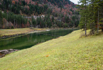 Alpine autumn .Sylvenstein Stausee lake, Germany