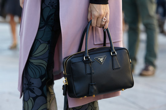 Woman with black Prada bag on September 24, 2015 in Milan, Italy