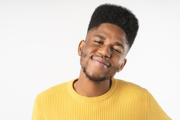 Obraz premium Portrait of happy african man enjoying isolated on white background