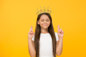make a wish. dreams come true. symbol of bright future. small child winner. girl is proud if...