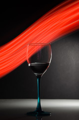 Transparent wine glass on dark background
