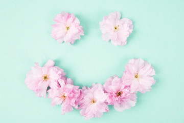 Smiley face made with sakura flowers