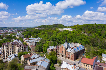 Fototapeta premium Aerial view on Church of John Chrysostom (former Church of the Sacred Heart of Jesus) in Lviv, Ukraine from drone
