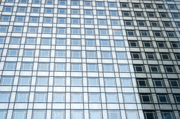 Fototapeta na wymiar geometry glass background. High-rise housing. Modern building steel walls and glass windows. Building construction. City designing and building. Architecture and structure. business rent building