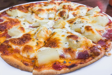 Appetizing gingerbread pizza  Italian cuisine. top view. vertically closeup.