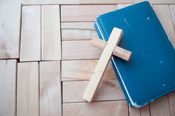 cross on wooden background