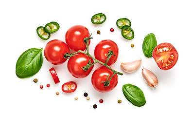 Tomato, basil, spices, pepper, garlic. Vegan diet food, creative cherry tomato composition isolated on white. Fresh basil, herb, tomatoes, cooking concept, top view.