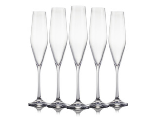 Set of empty champagne glasses in a row isolated on a white background