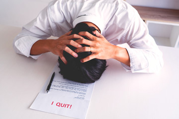 Businessman holding with I quit words card letter, resign employee Change of job concept.