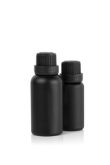 Mockup two empty black bottle of essential oil isolated on white background with clipping path, vertical view.