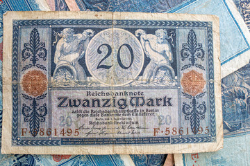 some old historical German banknotes lie spread out on a table