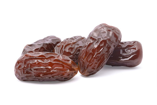 Dried date palm fruit isolated on white background with clipping path. dry fruit concept.