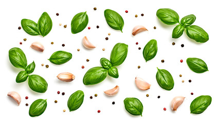 Basil, spices, pepper, garlic pattern. Vegan diet food, creative green basil background isolated on white. Fresh basil leaf layout, cooking concept, fashion wallpaper