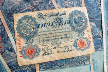 some old historical German banknotes lie spread out on a table