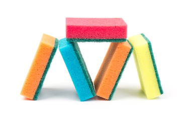 Colored sponges for washing dishes and other domestic needs, isoleted on white background