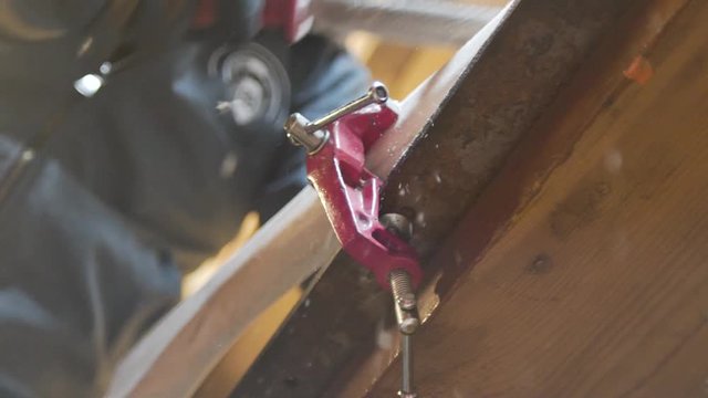 shaping the handle of an axe, flying sawdust