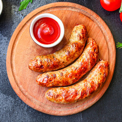 fried sausages, grilled meat or barbecue Menu concept, food background, keto or paleo diet. top...