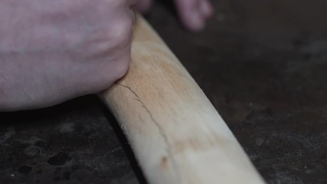 shaping the handle of an axe