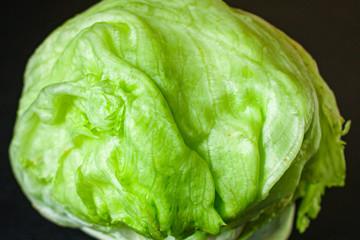 iceberg leaves  lettuce green freshness. Menu concept food background, keto or paleo diet. top view. copy space for text