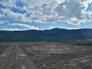 Small plateau and mountain on the horizon