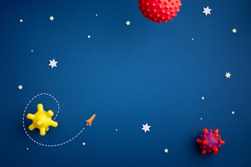 Obraz na płótnie Canvas blue background with astronaut, stars and rocket