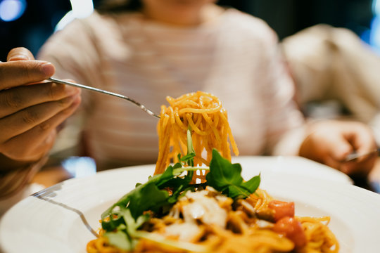 Woman Eating Spaghetti