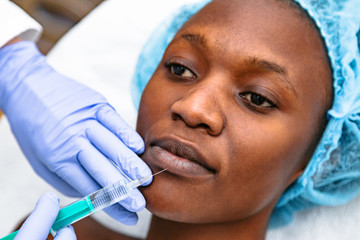 Cosmetic beauty injection to beautiful woman face