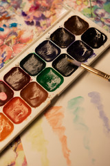 Watercolor paints with brush, watercolor brush strokes.