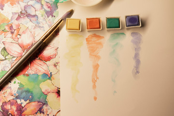 Watercolor paints with brush, watercolor brush strokes.