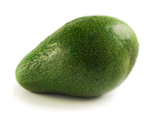 avocado whole placed horizontally isolated on a white background