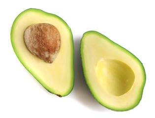 Two slices of avocado isolated on a white background. One slice with core. Design element for product label, catalog print, web use.