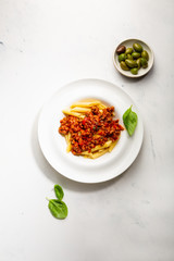 Tasty appetizing classic italian pasta with bolognese sauce