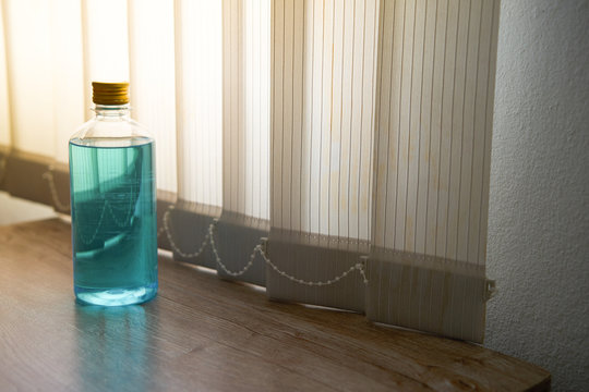 Alcohol Bottle For Refill On Table With Copy Space