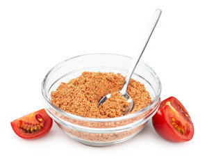 Portion of Tomato Powder isolated on white