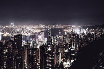 Filtered Fantastic aerial night view on Hong Kong - skyscrapers from the  the Peak .  Amazing   illuminated city