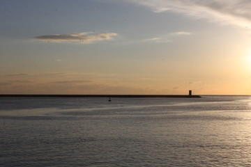 Sunset at the ocean, silhouettes, natural colors
