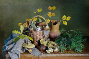 Still life with mushrooms from the forest in the basket