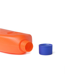 opened overturned orange bottle with blue lid, isolate on white background