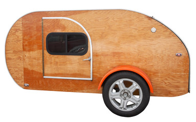 Homemade plywood teardrop camper. Isolated.