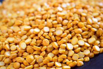 Chana Daal,Heap of yellow split chickpeas Indian raw food.