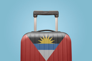 Baggage with Antigua and Barbuda flag print tourism and vacation concept.