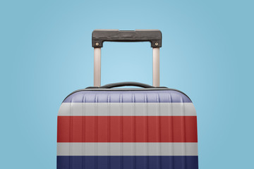 Baggage with Costa Rica flag print tourism and vacation concept.