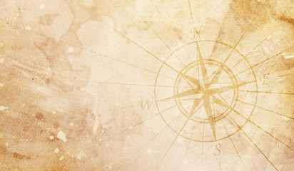Old compass on paper background - 345723087