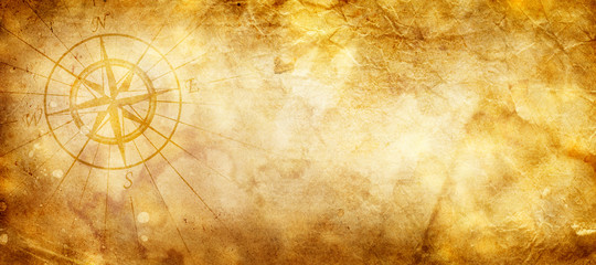 Old compass on paper background - 345723218