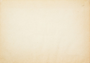 Old brown beige sheet of paper texture background. Blank vintage paper with copy space for text.