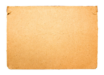 Brown sheet of cardboard isolated on white backhround. Piece of cardboard paper with copy space for text.