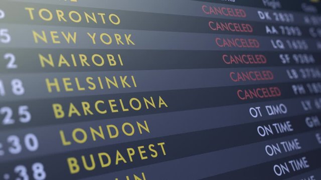 close-up of an airport departures board with flights from on time to canceled (3d render)