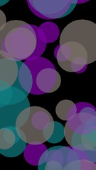 Multicolored translucent circles on a dark background. 3D illustration