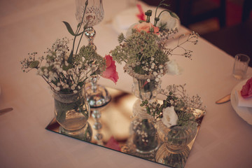 The beautifully arranged wedding decor renders the atmosphere of the holiday