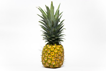 Isolated pineapple photographed in studio with white background